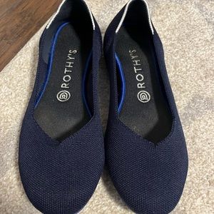 Rothy’s original white halo navy flats